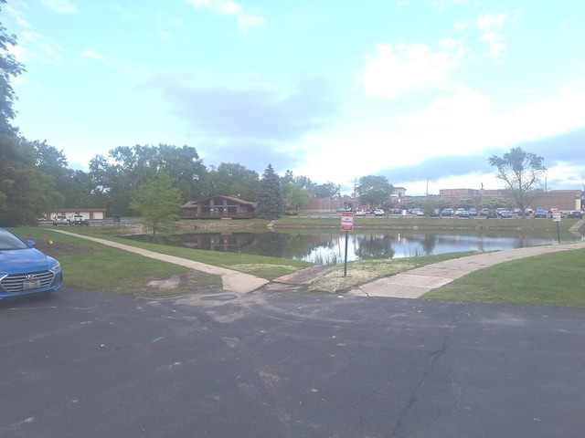 840 Elder Rd Unit A305, Homewood, IL 60430 - view of asphalt street with a water view and sidewalks
