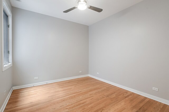 828 N California Ave Unit 3, Chicago, IL 60622 - empty room with light wood-style flooring, baseboards, and a ceiling fan