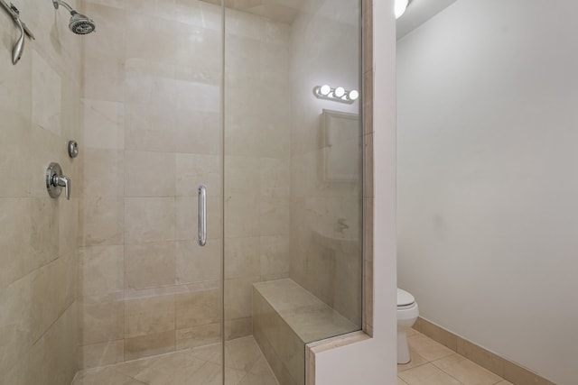 828 N California Ave Unit 3, Chicago, IL 60622 - full bath featuring toilet, tile patterned flooring, and a shower stall