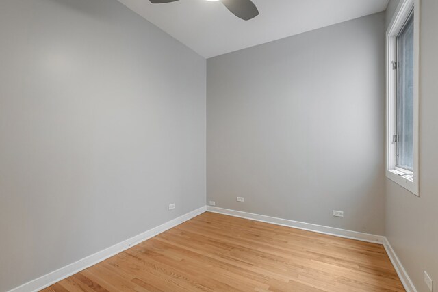 828 N California Ave Unit 3, Chicago, IL 60622 - spare room featuring ceiling fan, light wood-type flooring, and baseboards