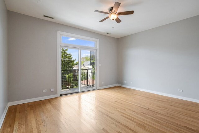 828 N California Ave Unit 3, Chicago, IL 60622 - unfurnished room with light wood-style floors, a ceiling fan, and baseboards