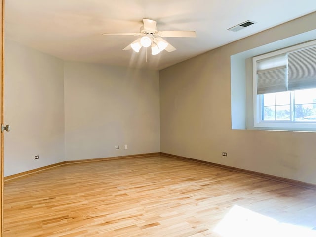 308 Ashbury Ct Unit 1515-1, Roselle, IL 60172 - empty room with light wood-type flooring and a ceiling fan