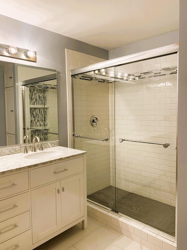 308 Ashbury Ct Unit 1515-1, Roselle, IL 60172 - full bathroom featuring a shower stall and vanity