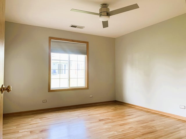 308 Ashbury Ct Unit 1515-1, Roselle, IL 60172 - unfurnished room featuring light wood-type flooring and a ceiling fan