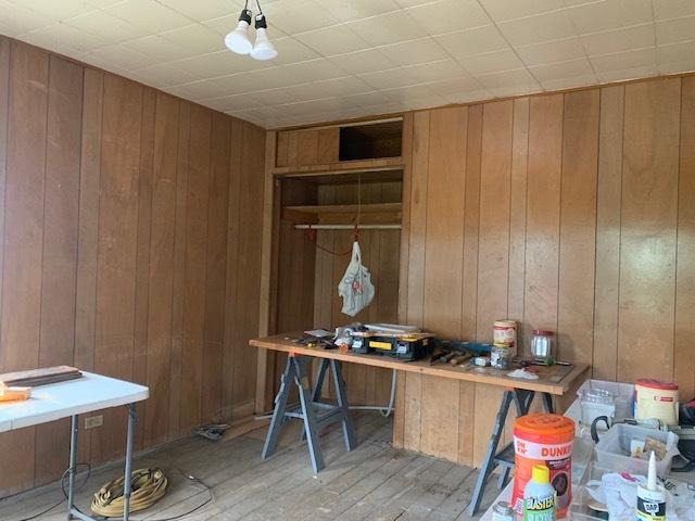 1013 Guion St, Ottawa, IL 61350 - office space featuring wood finished floors and wooden walls