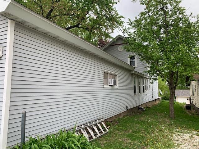 1013 Guion St, Ottawa, IL 61350 - view of home's exterior with cooling unit