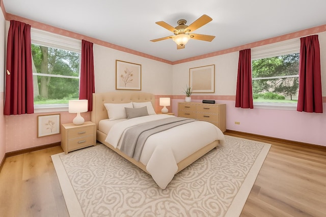 132 Pratt Blvd, Roselle, IL 60172 - bedroom featuring light wood-style floors, baseboards, and ceiling fan