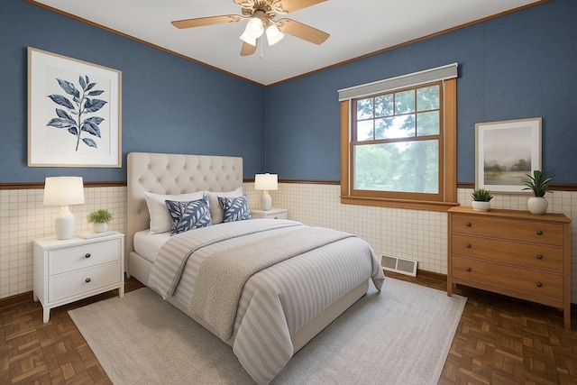 132 Pratt Blvd, Roselle, IL 60172 - bedroom featuring a wainscoted wall, ornamental molding, tile walls, and ceiling fan