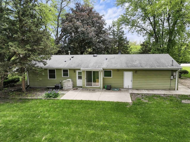 132 Pratt Blvd, Roselle, IL 60172 - back of house with a patio, a lawn, and a shingled roof