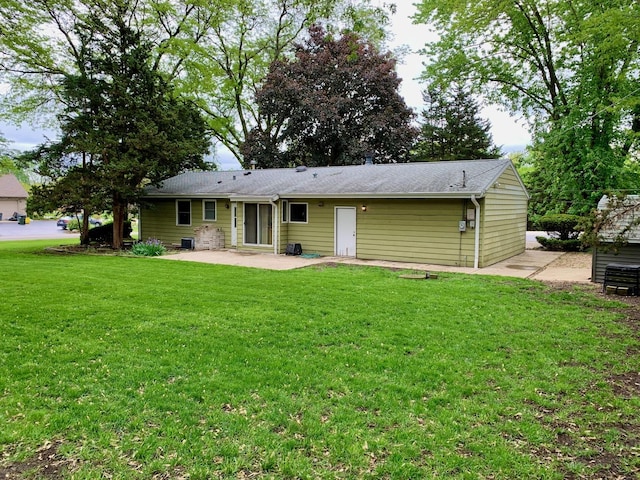 132 Pratt Blvd, Roselle, IL 60172 - back of property with a patio, a lawn, and a shingled roof