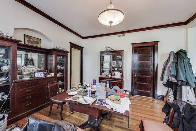 5357 N Wayne Ave, Chicago, IL 60640 - dining room with wood finished floors, ornamental molding, and an office area