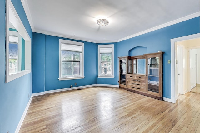 5357 N Wayne Ave, Chicago, IL 60640 - unfurnished room with hardwood / wood-style flooring, crown molding, and baseboards