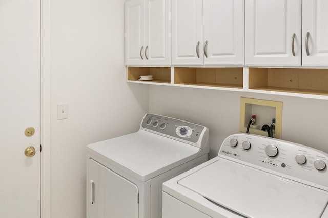 240 Regency Blvd, Sugar Grove, IL 60554 - laundry room with cabinet space and washing machine and dryer