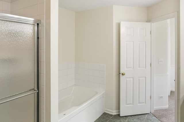 240 Regency Blvd, Sugar Grove, IL 60554 - full bathroom featuring a bath, a stall shower, and baseboards