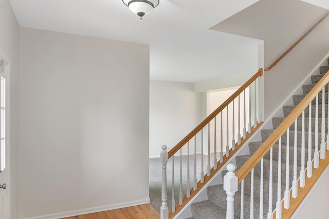 240 Regency Blvd, Sugar Grove, IL 60554 - staircase featuring wood finished floors and baseboards