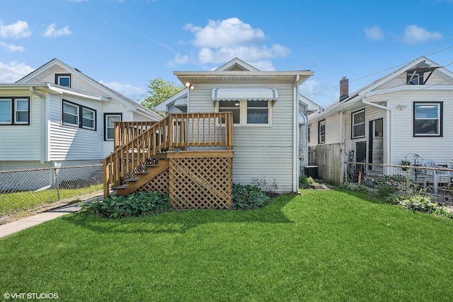 2630 N Austin Ave, Chicago, IL 60639 - rear view of house with stairs, a deck, and central AC unit