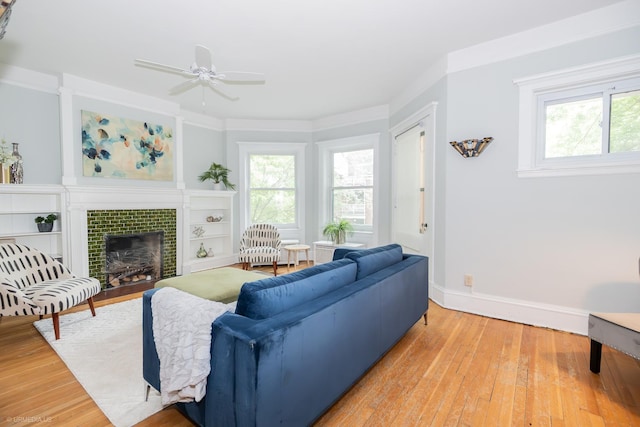 5707 S Blackstone Ave Unit 2, Chicago, IL 60637 - living area featuring ceiling fan, light wood finished floors, baseboards, and a tile fireplace