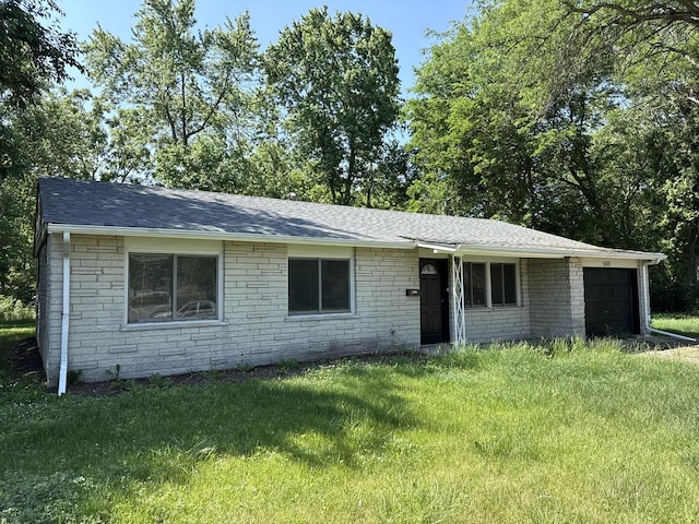 505 Barbara Ct, University Park, IL 60484 - view of front facade featuring an attached garage, a front yard, roof with shingles, and brick siding