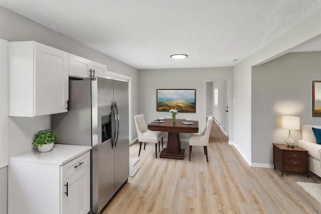505 Barbara Ct, University Park, IL 60484 - dining space featuring light wood finished floors and baseboards