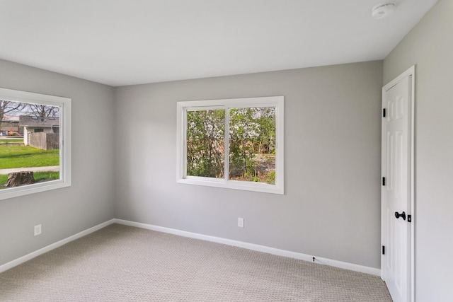 505 Barbara Ct, University Park, IL 60484 - spare room featuring carpet floors, baseboards, and a smoke detector