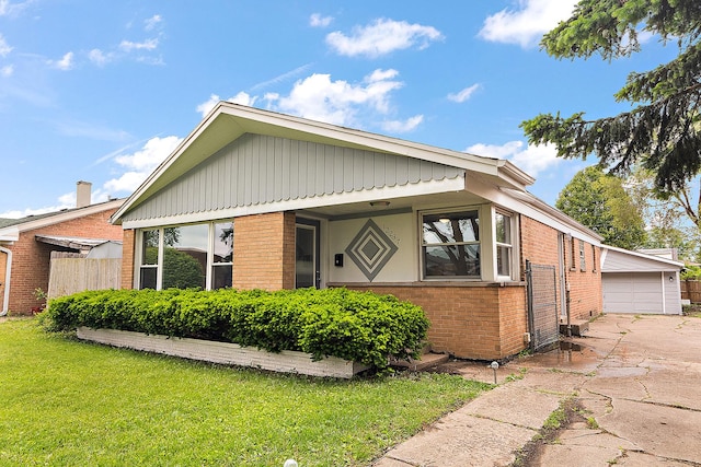 12237 S Avers Ave, Alsip, IL 60803 - view of front of property with brick siding, an outdoor structure, and a garage