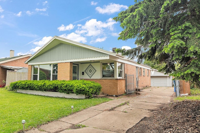 12237 S Avers Ave, Alsip, IL 60803 - view of front of property featuring brick siding, an outbuilding, and a garage