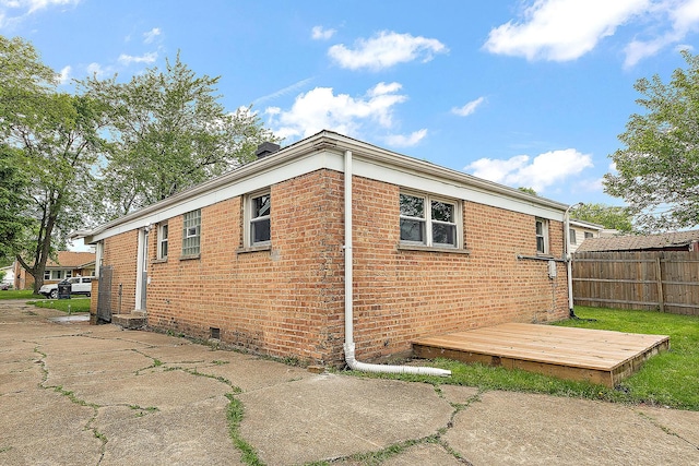 12237 S Avers Ave, Alsip, IL 60803 - view of property exterior featuring brick siding, crawl space, and a deck