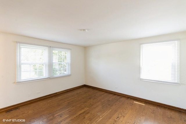 679 Aspen Dr, Buffalo Grove, IL 60089 - unfurnished room featuring baseboards and wood finished floors