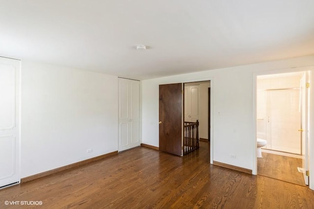 679 Aspen Dr, Buffalo Grove, IL 60089 - unfurnished bedroom featuring wood finished floors and connected bathroom