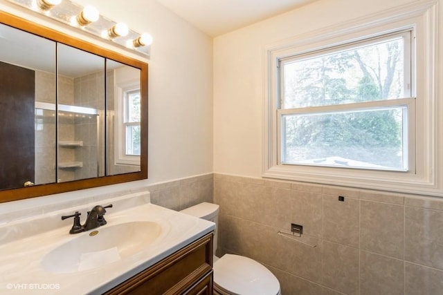 679 Aspen Dr, Buffalo Grove, IL 60089 - bathroom featuring vanity and wainscoting