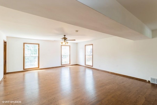 679 Aspen Dr, Buffalo Grove, IL 60089 - spare room with wood finished floors and a ceiling fan