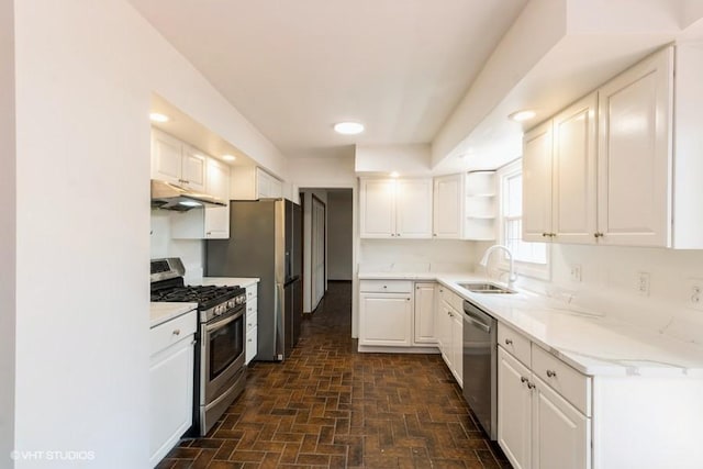 679 Aspen Dr, Buffalo Grove, IL 60089 - kitchen with stainless steel appliances, under cabinet range hood, white cabinets, open shelves, and recessed lighting