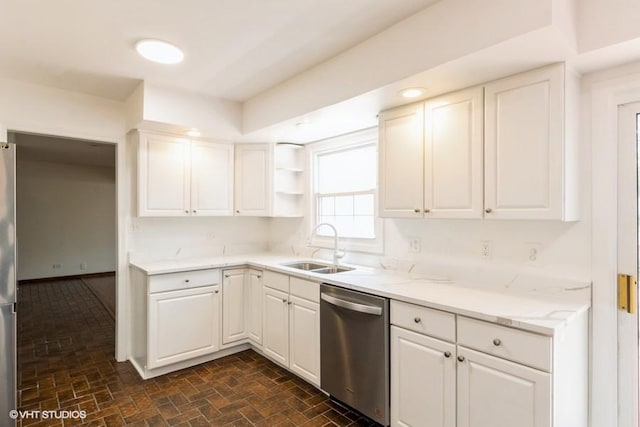 679 Aspen Dr, Buffalo Grove, IL 60089 - kitchen featuring stainless steel appliances, brick patterned floors, white cabinetry, light stone counters, and open shelves