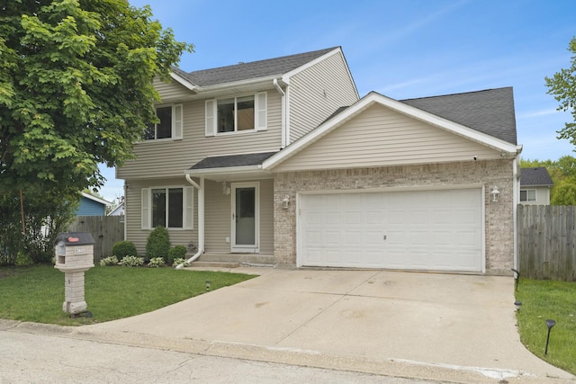3805 Brighton Ct, Zion, IL 60099 - traditional-style house with a garage, driveway, brick siding, and a shingled roof