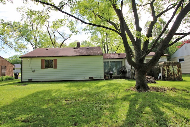 20 Johnathan Rd, Lake Zurich, IL 60047 - rear view of house with a lawn and a chimney