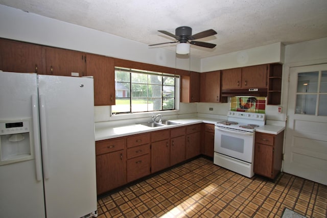 20 Johnathan Rd, Lake Zurich, IL 60047 - kitchen with white appliances, a sink, under cabinet range hood, light countertops, and open shelves