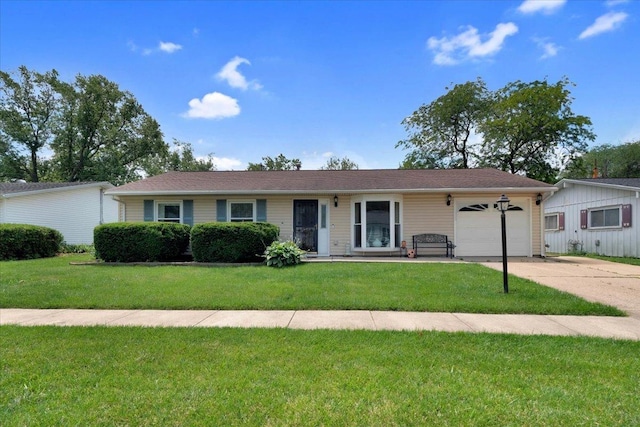2511 Sangamon Dr, Champaign, IL 61821 - ranch-style home featuring an attached garage, concrete driveway, and a front lawn