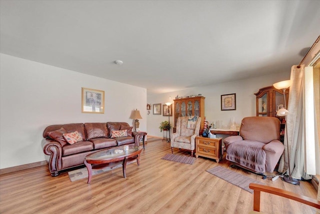 2511 Sangamon Dr, Champaign, IL 61821 - living area with light wood-style floors and baseboards