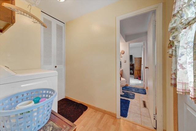 2511 Sangamon Dr, Champaign, IL 61821 - laundry room with light wood-style floors and baseboards