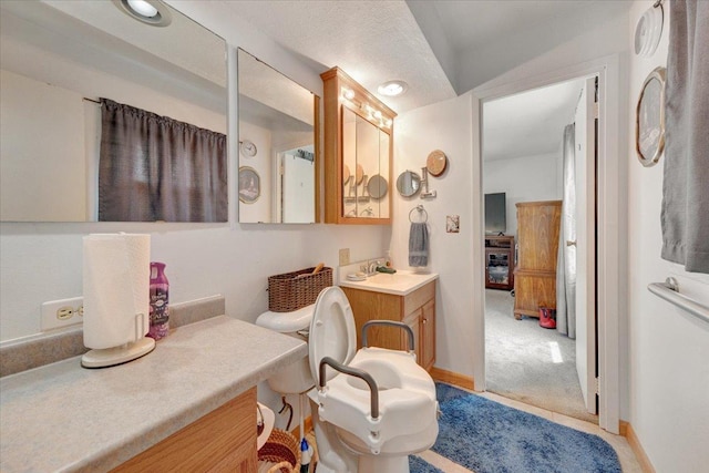 2511 Sangamon Dr, Champaign, IL 61821 - bathroom with vanity and baseboards