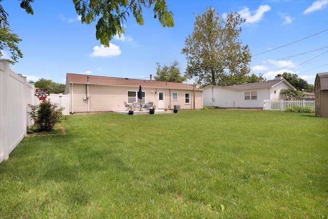 2511 Sangamon Dr, Champaign, IL 61821 - back of property with a fenced backyard and a patio area