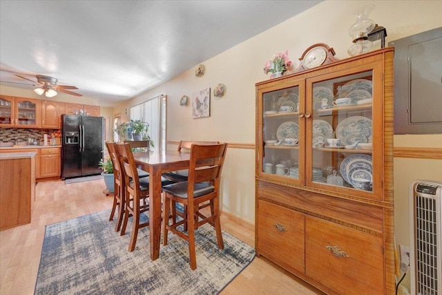 2511 Sangamon Dr, Champaign, IL 61821 - dining area with light wood-style flooring, ceiling fan, and heating unit