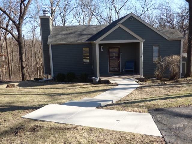 2 Tamarack Row, Galena, IL 61036 - ranch-style home with a chimney, a front yard, and a shingled roof