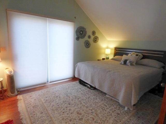 2 Tamarack Row, Galena, IL 61036 - bedroom with wood finished floors and lofted ceiling