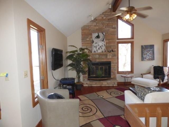 2 Tamarack Row, Galena, IL 61036 - living room featuring ceiling fan, a fireplace, wood finished floors, and baseboards
