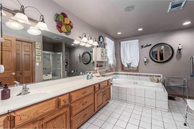 2598 N 2739th Rd, Marseilles, IL 61341 - full bathroom featuring a stall shower, a bath, tile patterned floors, double vanity, and recessed lighting