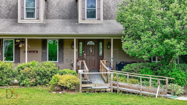 2598 N 2739th Rd, Marseilles, IL 61341 - view of exterior entry with a porch and roof with shingles