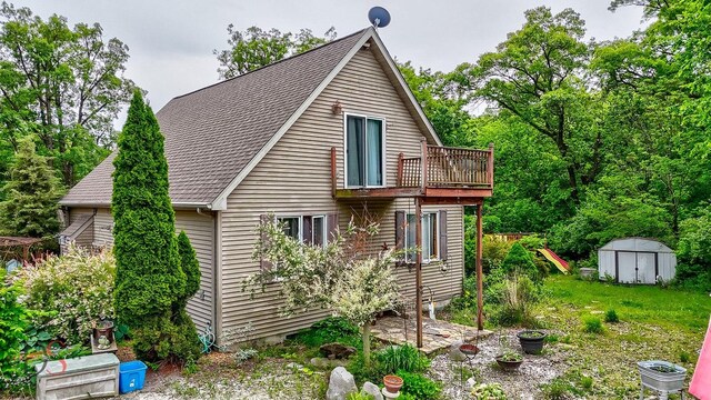 2598 N 2739th Rd, Marseilles, IL 61341 - view of side of home with a balcony and roof with shingles