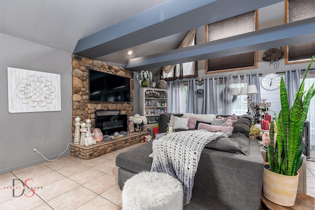 2598 N 2739th Rd, Marseilles, IL 61341 - living room featuring tile patterned flooring, lofted ceiling, a fireplace, and baseboards