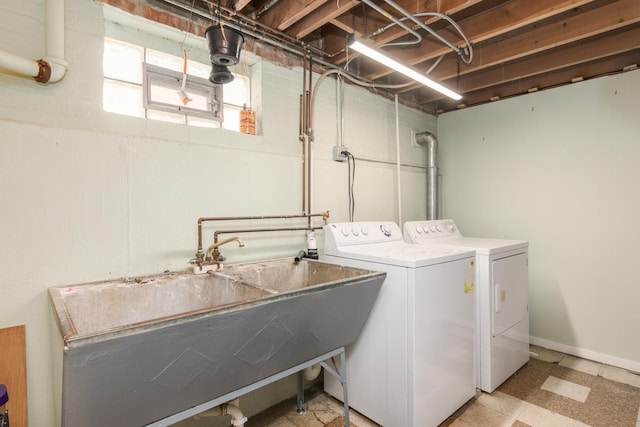 6136 N Nagle Ave, Chicago, IL 60646 - laundry area with washing machine and dryer and baseboards